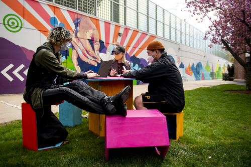 04/27/21 - BOSTON, MA: Noah Wendel, Sung Jun Kim and Acadia Alden, who all study architecture, work on installation for a Furniture Urban...