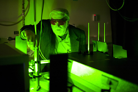 November 30, 2012 - Paul Champion, Chair of the Physics Department, works with lasers to analyze biomolecules.